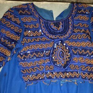 Beautiful Deep Blue Lehenga with heavily embroidered crop top.